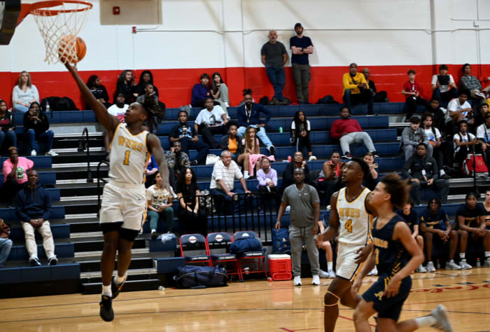 Winter Haven guard Tyrese Mayo goes in for a basket during the first half of the championship game against St. Thomas Aquinas on Saturday at the Kingdom in the Sun Tournament at Vanguard High School in Ocala.